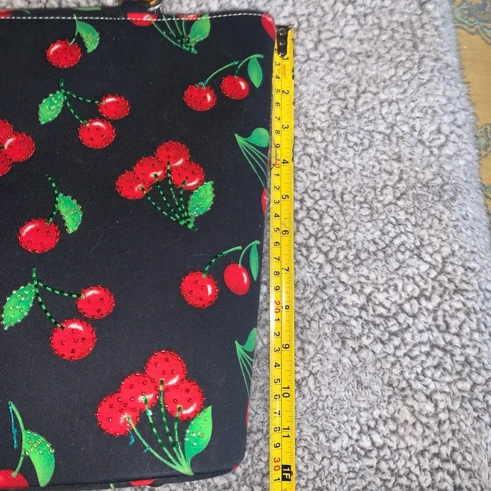 Black purse with red cherries and bamboo handles large